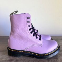 Dr. Martens 1460 Pascal Women's Lace Up Boot Lilac Colorway New Without Box Women’s Size 7 Please Review All Pictures For Any Signs Of Blemishes And/Or Defects Item Shown In Pictures Is What You Are Purchasing No Rips Or Tears Odor Free All Reasonable Offers Considered Smoke Free Environment Even Though Most Of Our Shoes Are Sold As “New” There Is A Chance That They May Have Been Previously Tried On In Store With Dust And/Or Dirt On The Soles And Insoles There Are Also Times Where We Will Not Sa High-top Leather Footbed Boots For Spring, Spring High-top Boots With Leather Footbed, High-top Boots With Leather Footbed For Spring, Classic High-top Spring Boots, Classic High-top Boots For Spring, Spring Boots With Lacing And Round Toe, Purple Leather Spring Boots, Spring Purple Leather Boots, Purple Round Toe Boots For Spring