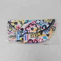 Brighton Graffiti Love Crossbody Belt Bag NWT Still Sealed in Bag Approx. 11" by 6" as roughly measured in bag. sku 6699 Brighton Graffiti, Ladybug Purse, Western Style Purse, Crossbody Belt Bag, Brighton Purses, Reversible Tote Bag, Brighton Bags, Leather Handbags Crossbody, Tote Bag Purse