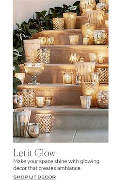 an advertisement with candles and vases on the steps that lead up to a planter