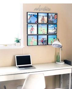 a laptop computer sitting on top of a white desk next to a lamp and chair