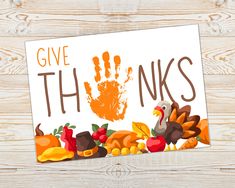 a thanksgiving card with the words give thanks and handprinted turkeys on it