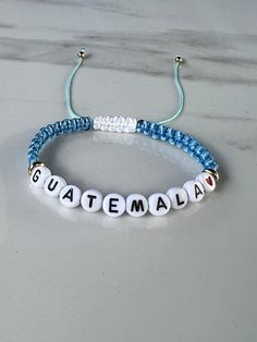 Guatemala bracelet  Returns & exchanges  NOT ACCEPTED  But please contact me if you have problems with your order. Personalized Adjustable Beaded Bracelets As Souvenir, Customized Adjustable Bangle Bracelets, Customized Adjustable Bangle Bracelet, Adjustable Beaded Bracelets With Letter Beads As Souvenir, Adjustable Blue Jubilee Charm Bracelet, Adjustable White Bracelet Souvenir, Customized Adjustable Blue Bracelets, Customized Adjustable Blue Name Bracelet, Customized Blue Adjustable Name Bracelet