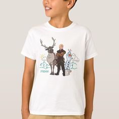 a young boy wearing a white t - shirt with an image of two reindeers