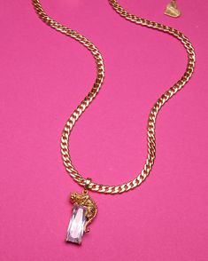 This luxurious Jaguar Necklace features an exquisite jaguar design with a glittering rectangle crystal accent, perfect for adding a hint of glamour and extravagance to every outfit. It is the quintessential piece of jewelry for adding an elegant, sophisticated touch to any ensemble. *14"-16" Adjustable Necklace (Sizes Available) *18K Gold Plated *Lead and Nickel Free, Hypoallergenic *Handmade in Los Angeles Formal Rectangular Pendant Chain Jewelry, Luxury Crystal Jewelry Rectangular Shape, Glamorous Gold Rectangular Jewelry, Jaguar Necklace, Jaguar Design, Face Jewellery, Elegant Sophisticated, Nameplate Necklace, Belly Chain