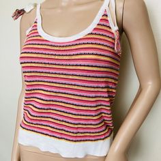 "Women's XS-S cotton acrylic 32\" bust 21\" length Fun and flirty textured summer tank top with little ties at the shoulders. In red, pink, brown and yellow knit stripe print. Light and comfy. In excellent condition with no noticeable flaws." Striped Knit Tops For Vacation, Striped Knit Tank Top For Summer, Pink Cotton Tops With Tie Straps, Spring Striped Knit Tank Top, Multicolor Knit Tank Top For Summer, Striped Knit Tank Top For Spring, Striped Cotton Tank Top For The Beach, Striped Cotton Tank Top For Vacation, Collar Bodysuit