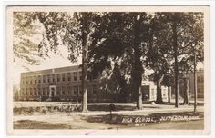 an old black and white photo of a high school