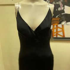 This Dress Is New With Tags And Is In Good Condition. Sleek Maxi Dress For Night Out With Flattering Silhouette, V-neck Mini Dress For Date Night Evening, Sleek V-neck Slip Dress For Cocktail, Sleek Evening Dress With Flattering Silhouette For Party, Sleek Evening Dress For Night Out, Elegant Sleeveless Mini Dress For Dinner, Silk V-neck Maxi Dress For Night Out, Chic Black Evening Dress With Flattering Silhouette, Black Satin V-neck Evening Dress