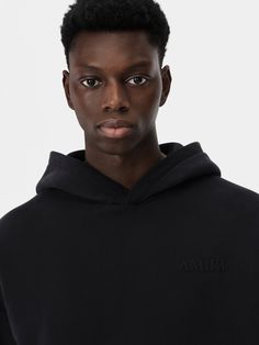 Magnified volumes and monochrome accents come to the fore for Pre-Fall 2024 menswear. The AMIRI Oversized Hoodie features core logo embroidery on the chest and back. PRE-FALL 2024 COLLECTION MADE IN ITALY 100% COTTON 2024 Menswear, Shorts Sweatpants, Denim Outerwear, Vintage Jerseys, Crossbody Tote Bag, New Sneakers, Oversized Hoodie, Crossbody Tote, Cool Socks