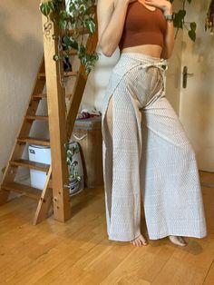 "Handmade wrap pants that can be adjusted at the waist.  🌿 I sew the pants to be a little on the longer side, if you have shorter legs I will adjust them to your length for free! Waist starts at: 55cm / 22\" Leg inseam: 77cm / 30\" It works by wrapping one side around you, making a bow in the back. Then passing the fabric through under your legs and wrappjung the other bow in the front.    All my products are made by myself in my little bedroom in germany and are not 100% perfect. Im not a prof Casual White Split Bottoms, White Split Bottoms For Spring, White Wrap Bottoms For Spring, White Bohemian Wide-leg Pants, Summer Cotton Wrap Bottoms, Summer Wrap Cotton Bottoms, Spring Cotton Wrap Bottoms, Bohemian Style High Waist White Wide Leg Pants, Bohemian White High Waist Wide Leg Pants