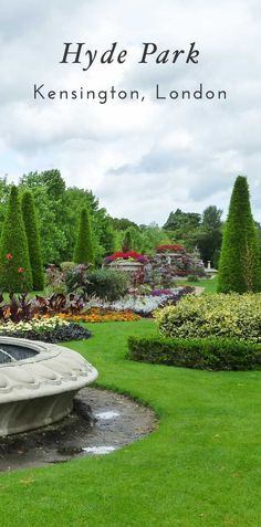 the hyde park garden is full of flowers and trees, with a fountain in the middle