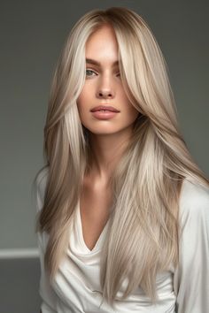 From icy platinum to warm honey, blonde hair color ideas cover a diverse spectrum. Explore the different shades and undertones to find the perfect blonde that matches your skin tone and reflects your personal style. Warm Honey Blonde Hair, Warm Golden Blonde Hair, Honey Blonde Hair Color Ideas, Cool Toned Blonde, Warm Honey Blonde, The Perfect Blonde, Champagne Blonde Hair, Sandy Blonde Hair