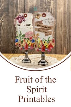 the fruit of the spirit printables are displayed in front of a wooden background