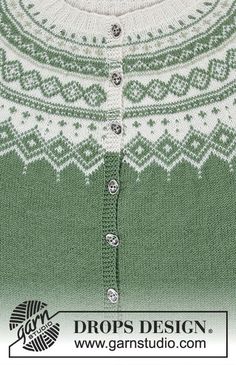 a green and white knitted sweater with buttons on the front, showing an intricate design