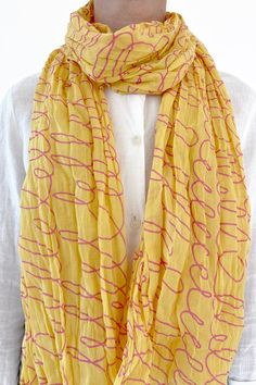 These 100% cotton scarves are the perfect accessory in any season. Experience the luxurious touch of soft, lightweight cotton scarves that add a splash of color to any outfit! From subtle patterns to bright, vibrant shades, these delicately crinkled cotton scarves will make you stand out — and do it in style. Transform your wardrobe with an order of these beautiful cotton scarves! They measure a generous 44 by 70 inches and can be easily styled in different ways. They come packaged twisted in a Trendy Cotton Scarves For Summer, Trendy Cotton Scarf For Summer, Trendy Cotton Summer Scarves, Trendy Summer Cotton Scarves, Casual Yellow Scarf For Spring, Lightweight Cotton Casual Scarves, Lightweight Cotton Casual Scarf, Casual Lightweight Cotton Scarves, Pink Cotton Scarf For Spring