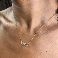 "This 14k personalized diamond name necklace is the perfect gift for the bridal party, someone special, or yourself. * All letters are capital. M A T E R I A L & L E N G T H Available in 14k Yellow Gold, 14k Rose Gold, 14k White Gold, Sterling Silver Thickness: 1.2mm / 0.05\" Initials: 6 mm Diamond: 0.15 ct. - 0.40 ct. depending on the name Color: G Quality: SI-VS Additional Notes: * Non-Conflict Diamonds * Made in the USA C U R R E N T ∙ T U R N A R O U N D Processing Time:1-2 weeks Within Diamond Name Necklace, Name Necklace Silver, Necklace Diamond, Diamond Gift, Gold Diamond Jewelry, Letter Necklace, Silver Rose Gold, Quality Diamonds, Birthday Gifts For Her