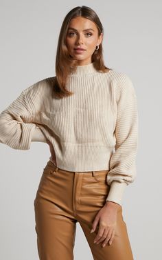 Give the autumn-winter season a warm welcome in our Valerie Jumper! This mid weight knit features a ribbed high neckline, long balloon sleeves with cinched cuffs and a wide ribbed hem. It's easy to throw on and perfect for the cooler seasons. Pop it on with some denim jeans, heeled boots and a mini handbag for a chic day to night look!Product Details  Pull over style, no fastening  Ribbed high neck  Long balloon sleeves with cinched cuffs  Wide ribbed hem  Mid weight  Textured knit finish  No li Mini Handbag, Long Balloons, Mini Handbags, Night Looks, Textured Knit, Knit Jumper, Balloon Sleeves, High Neckline, Winter Season