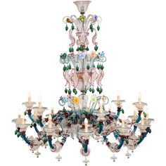 a large chandelier with many lights on it's sides and an elaborate design