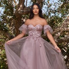 The Cute Dress Made Of Delicate Tulle Has A Structural Corset With Underwire That Is Decorated With A Small Number Of Floral Appliques. Removable Puff Sleeves Will Make Your Look Unique, While An Inconspicuous Zipper On The Back Will Ensure A Secure Fixation Of The Dress. Fabric: Tulle Length: Long Colour: Mauve Neckline: Off Shoulder Silhouette: Ball Gown Sleeve: Removable Puff Sleeves Back: Semi-Open, Zipper Skirt: Layered Embellishments: Floral Applique Occasion: Romantic Date/Evening/Dinner, Off The Shoulder Princess Dress, Purple Wedding Dress The Bride Lavender, Fitted Tulle Ball Gown For Mother Of The Bride, Fitted Tulle Mother Of The Bride Ball Gown, Tulle Dresses With Detachable Train, Fitted Ball Gown With Tulle Skirt For Bridesmaids, Bridesmaid Dress With Detachable Train And Floor-length, Bridesmaid Dress With Detachable Train And Sweetheart Neckline, Bridesmaid Gown With Fitted Bodice And Tulle Material