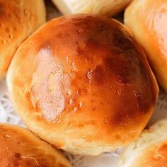 closeup of bread rolls on a white doily