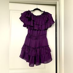 This Off The Shoulder Misa Los Angeles Party Dress Is A Deep Purple With Frilly Layers. Size: Xs New, Still With Tags! Purple Fitted Tiered Mini Dress, Fitted Purple Tiered Mini Dress, Purple Flowy Mini Dress For Party, Flowy Purple Mini Dress For Party, Purple Tiered Dress For Brunch, Chic Tiered Purple Mini Dress, Chic Purple Tiered Mini Dress, Los Angeles Party, Rose Maxi Dress