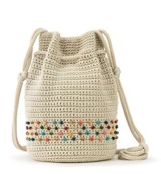 a crocheted bag with multicolored beads on the front and side handles