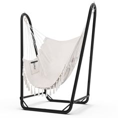 a white hammock hanging from a black stand