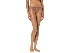 Wolford Satin Touch 20 Tights - Hose : Caramel : Please note that the number in the style name indicates denier or density of the nylon. The Wolford® Satin Touch 20 Comfort Tights flaunt a sheer stretch nylon fabrication that feels satiny on the skin and imparts an elegant shimmer for understated glamour. Soft waistband for comfortable wear all day and night. Toe reinforcement is almost invisible. Cotton gusset. Style #014776. 88% nylon, 12% elastane. Hand or machine wash. Imported. If you're no Micro-elastic Sheer Nylon Stockings, Sheer Compression Nylon Tights, Solid Nylon Compression Hosiery, Solid Sheer Nylon Bottoms, Solid Nylon Sheer Bottoms, Sheer Solid Nylon Bottoms, Solid Compression Nylon Hosiery, Solid Color Nylon Legwear With Smoothing Details, Sheer Compressive Hosiery