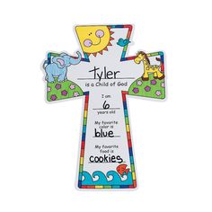 a cross shaped bookmark with the words tyler is a child of god