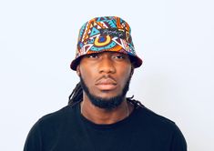 Size: 24 inches in diameter Reversible African print bucket hat Print: Makossa Teal and Aisha Reversible Multicolor Bucket Hat, Casual Multicolor Reversible Sun Hat, Fun Multicolor Reversible Hats, Trendy Reversible Multicolor Sun Hat, Multicolor Reversible Cotton Bucket Hat, Reversible Multicolor Cotton Bucket Hat, Trendy Multicolor Reversible Sun Hat, Multicolor Bucket Hat For Summer Streetwear, Casual Multicolor Reversible Bucket Hat