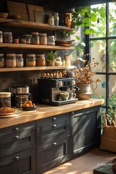 a kitchen filled with lots of pots and pans on top of a wooden counter