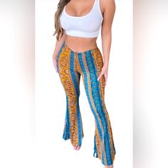 Blue And Yellow Never Worn Fitted Bohemian Blue Bottoms, Stretch Blue Bohemian Bottoms, Blue Bohemian Pants For Spring, Bohemian Blue Pants For Spring, Blue Fitted Bohemian Bottoms, Blue Stretch Bohemian Bottoms, Fitted Blue Bohemian Bottoms, Yellow Flare Pants, Groovy Fitted Multicolor Bottoms