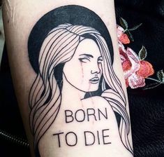 a woman's arm with the words born to die on it and an image of a