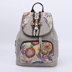 The perfect backpack for any free-spirited wanderer. This Meve Canvas Backpack features intricate floral embroidery and is made of durable canvas. It's bound to turn heads with its eye-catching design. Whether you're going on a day hike or a long-awaited international trip, this backpack will make sure all your belongings are safely stored and within reach. So go ahead and explore the world—this backpack will be your trusty sidekick along the way. Specs: Material: Polyester/ Cotton/ Canvas Size:32cmX28cmX15cm\12.60inchX11.02inchX5.91inch(Approx.) Interior Slot Pocket Soft Handle Open Pocket Embroidery design Bohemian Travel Bags In Fabric, Bohemian Fabric Travel Bag, Casual Floral Embroidered Backpack, Casual Floral Embroidery Backpack, Bohemian Beige Backpack, Summer Travel Backpack In Cotton, Travel Backpack With Floral Embroidery, Casual Embroidered Backpack For Everyday Use, Floral Embroidery Travel Backpack