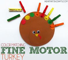 a turkey made out of construction paper and colored crayons with the words, color matching fine motor turkey