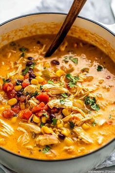 a white bowl filled with chicken tortilla soup