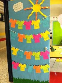 a bulletin board with clothes hanging from it's sides and words on the front