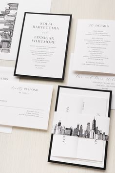 the wedding stationery is laid out on top of each other