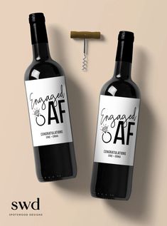 two bottles of wine next to a corkscrew with the words engaged safe on it