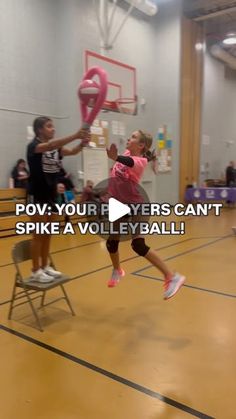 two girls are playing basketball in a gym with the caption above them that reads, do your players can't spike a volleyball ball