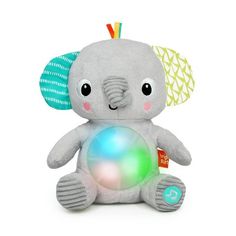 an elephant stuffed animal holding a ball with its trunk and eyes closed, on a white background