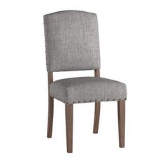 the side view of a grey chair with buttons on it's upholstered seat