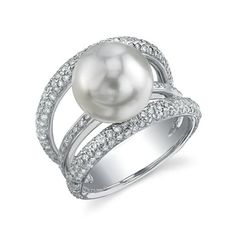 This gorgeous pearl ring is mounted with a beautiful White South pearl with exceptional luster. The ring is comprised of the highest quality 18K gold, in either white or yellow gold, and is adorned with sparkling SI quality diamonds. This ring is available in ring sizes 4.0 through 9.0. All pearl rings are approved by our staff of GIA pearl experts and come packaged in a beautiful pearl jewelry box, creating an elegant presentation. All pearl rings come with a certificate of authenticity, verify White Gold Pearl Ring, Traditional Engagement Rings, Gold Pearl Ring, Geode Earrings, Diamond Eternity Ring, Pearl Jewelry Sets, Sea Pearl, Eternity Ring Diamond, Sea Pearls