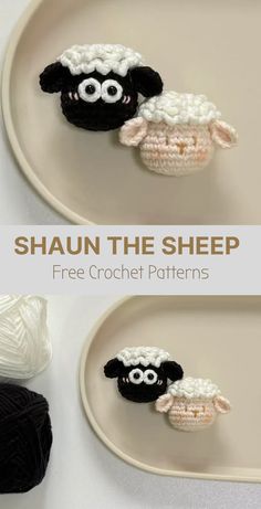 two crocheted sheeps sitting on top of a plate next to each other