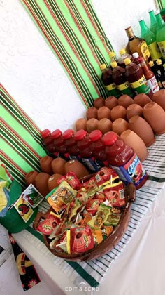 an assortment of condiments are displayed on a table with eggs and sauces