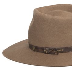 ↑ Click above to watch the video! ↑ Midtown is a sturdy wool fedora with a tall blocked teardrop crown that features a genuine leather hatband, a wide flat brim, and an adjustable sweatband. Perfect for your favorite fall outfit. Material: 100% WoolBrim: 3 1/2"Crown: 4 1/2 teardropHatband: 5/8 leatherClimate: Cold Hand-finished in the US. If your measurement falls between sizes, choose the next largest size. A looser fit is recommended as you can use hat size reducer tape to help nail the perfec Western Fedora With Flat Crown For Fall, Winter Leather Fedora With Flat Crown, Leather Felt Hat With Flat Brim For Fall, Wool Fedora For Rodeo In Fall, Western Style Winter Fedora, Wool Fedora For Rodeo And Fall Season, Western Style Fedora For Winter, Wool Fedora For Fall Rodeo, Brimmed Hat Bands For Ranch In Fall