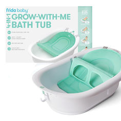 the baby bathtub has two trays in it and is open to show its contents