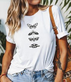 This retro simple butterfly design unisex t-shirt gives off a vintage vibe, perfect for casual everyday wear or as a statement piece. Ideal for those who love minimalist and nostalgic designs. Great for spring and summer outfitting, as well as nature lovers and fashion enthusiasts. Suitable for casual outings, picnics, or nature walks. Product features - 100% Airlume combed and ring-spun cotton fabric - Retail fit for casual and semi-formal settings - Manufactured in the US and internationally in a sustainable way - Tear-away label for minimized skin irritations - Variety of fabric blends available for different color options Care instructions - Machine wash: cold (max 30C or 90F) - Non-chlorine: bleach as needed - Tumble dry: low heat - Iron, steam or dry: medium heat - Do not dryclean Simple Butterfly Design, Minimalist Tshirt, Tee Outfits, Retro Minimalist, Simple Butterfly, Butterfly Top, Vintage Vibe, Tshirt Outfits