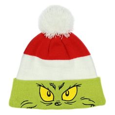 a green and white hat with yellow eyes