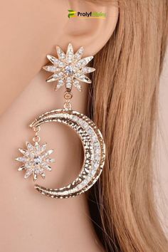 These earrings add a touch of sophistication to your style. drop earring boho|gold and crystal drop earring| elegant drop earring|luxury drop earring|trendy drop earring #earring #Style #Dangleearring #fashionstyle #jewelry #shabbychicearrings #shabbychic #jewelries  #accessories #womenjewelry #womenearrings #style #stylishearring #dangleearring Trendy Alloy Single Earring, Trendy Single Alloy Earring, Trendy Alloy Earrings For Party, Trendy Alloy Jewelry With Matching Earrings, Trendy Alloy Party Earrings, Trendy Dangle Hoop Earrings In Alloy, Alloy Crystal Drop Earrings For Party, Party Alloy Crystal Drop Earrings, Trendy Alloy Crystal Earrings