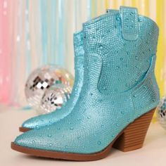 Be The Center Of Attention In These Sparkly Rhinestone Cowboy Boots New In Box Faux Leatherette Rhinestone Encrusted Uppers Lightly Padded Insole Chunky Block Heels Heel Height: 3 In. Fitting: True To Size. Regular Fit. Blue Rhinestone Boots For Fall, Blue Rhinestone Boots For Spring, Spring Blue Boots With Rhinestones, Blue Ankle Boots For Party, Blue Party Boots With Rhinestones, Blue High Heel Boots With Rhinestones, Blue Western Party Boots, Blue Rhinestone Party Boots, Trendy Blue Boots With Rhinestones